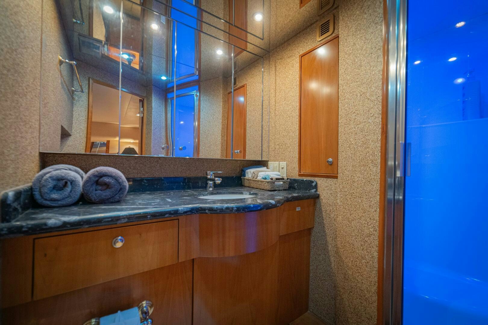 a bathroom with a marble counter top aboard MARLIN CLIPPER Yacht for Sale