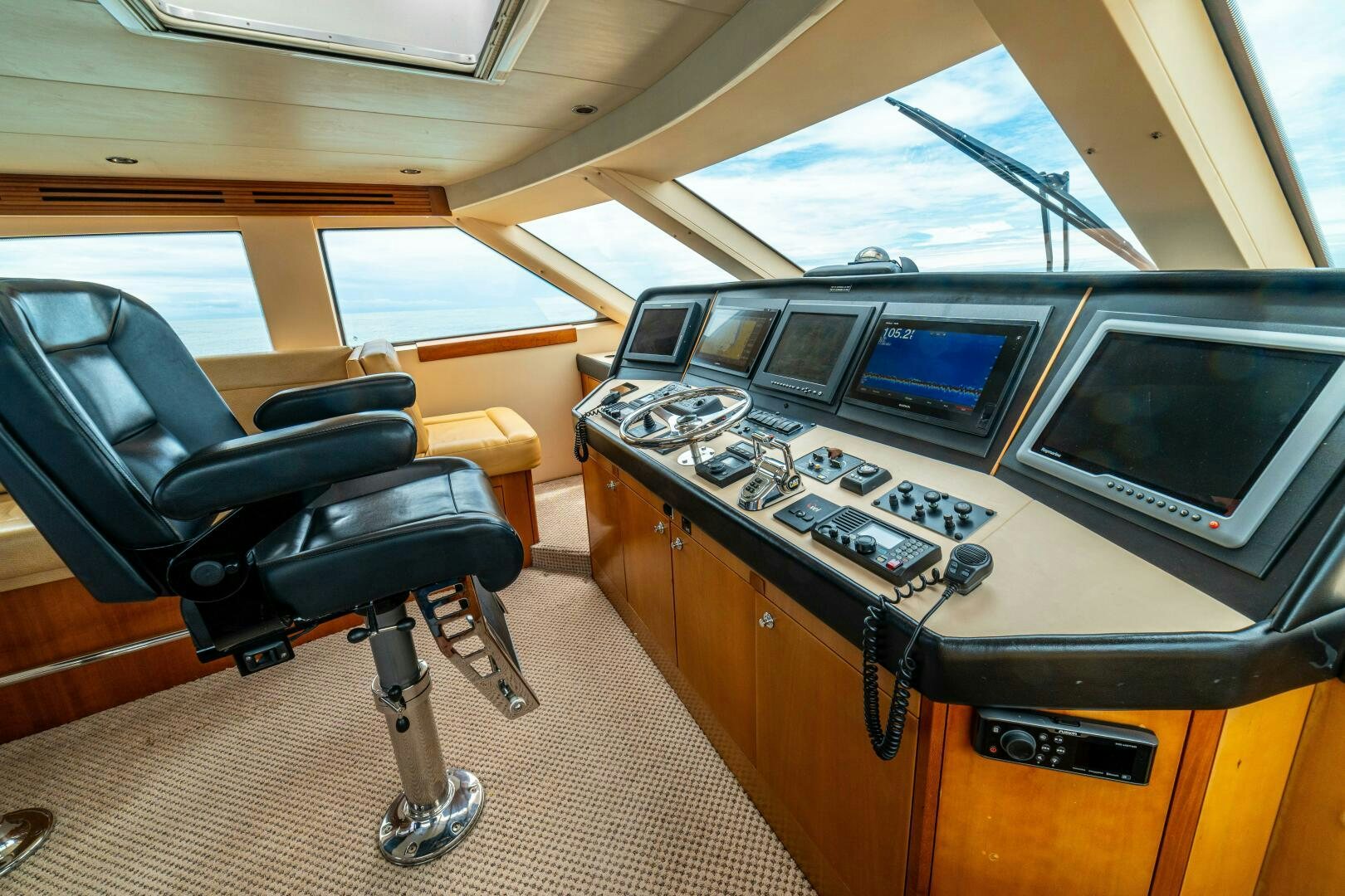 a room with a desk and chairs aboard MARLIN CLIPPER Yacht for Sale