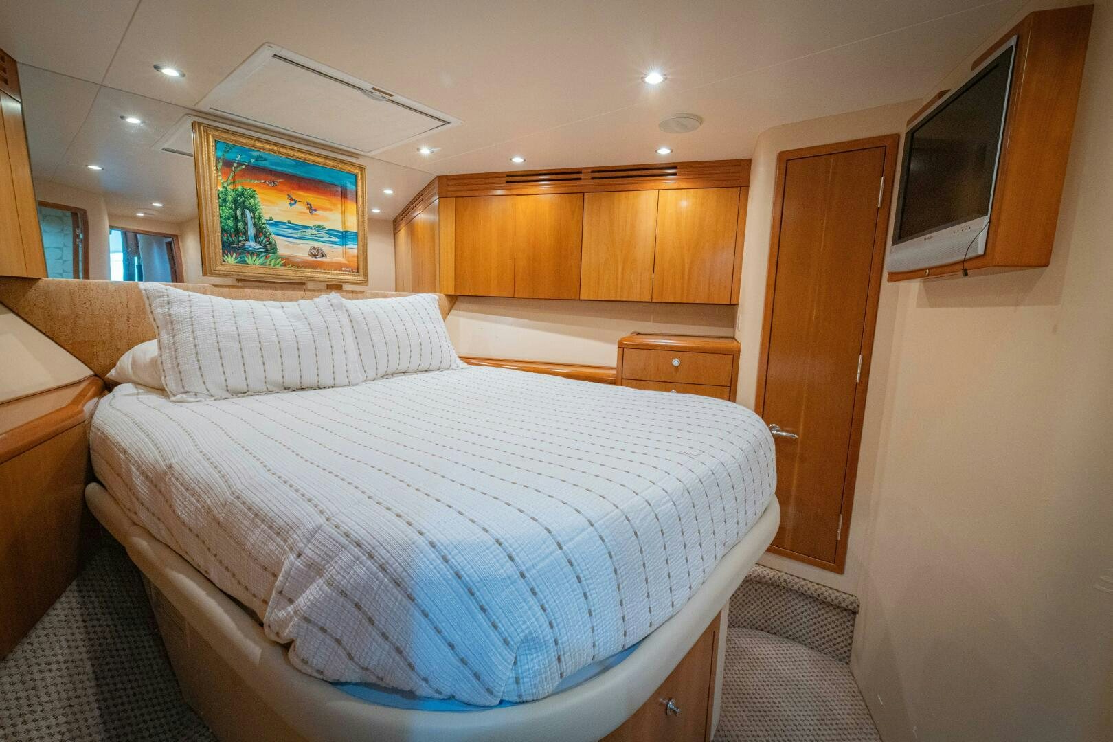 a bed in a room aboard MARLIN CLIPPER Yacht for Sale