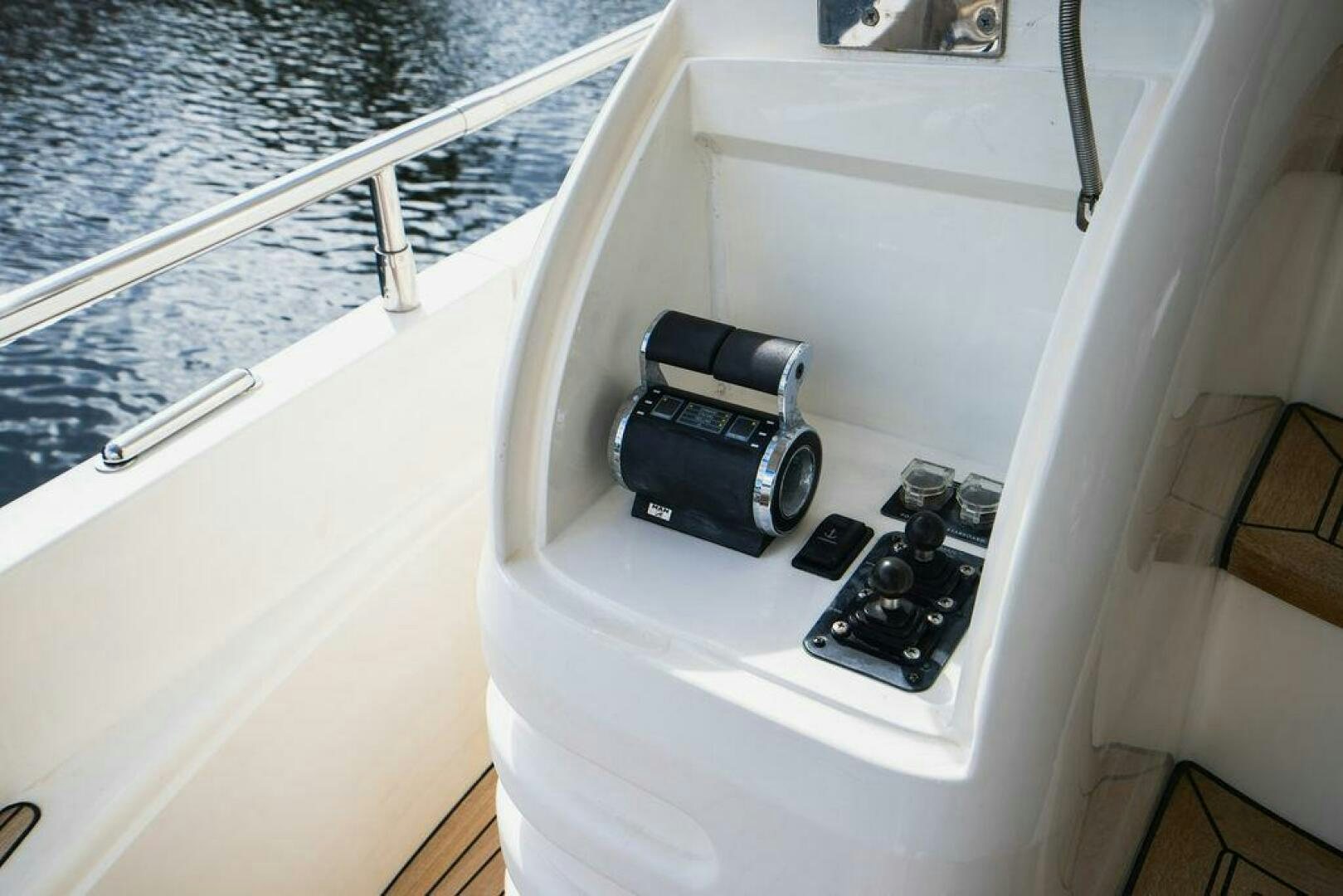 a black and white object on a white surface aboard EMPIRE SUN Yacht for Sale