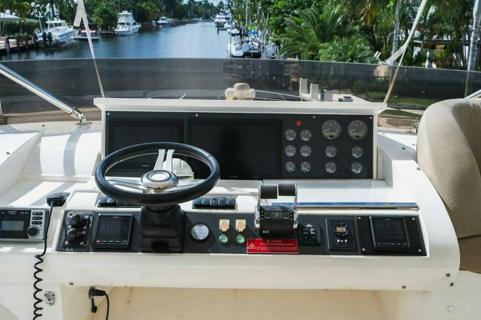 a car with a steering wheel aboard EMPIRE SUN Yacht for Sale