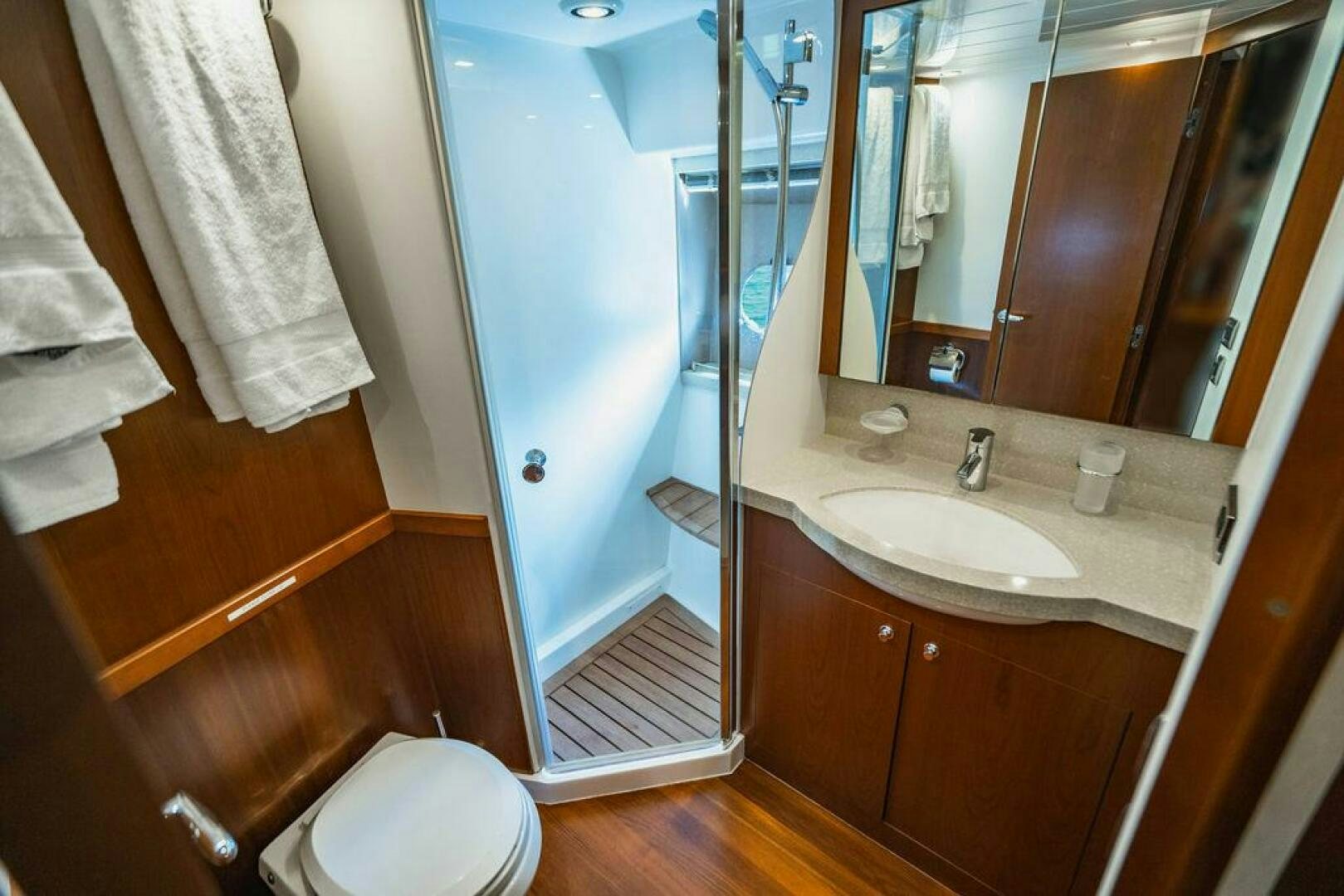 a bathroom with a sink and a toilet aboard EMPIRE SUN Yacht for Sale