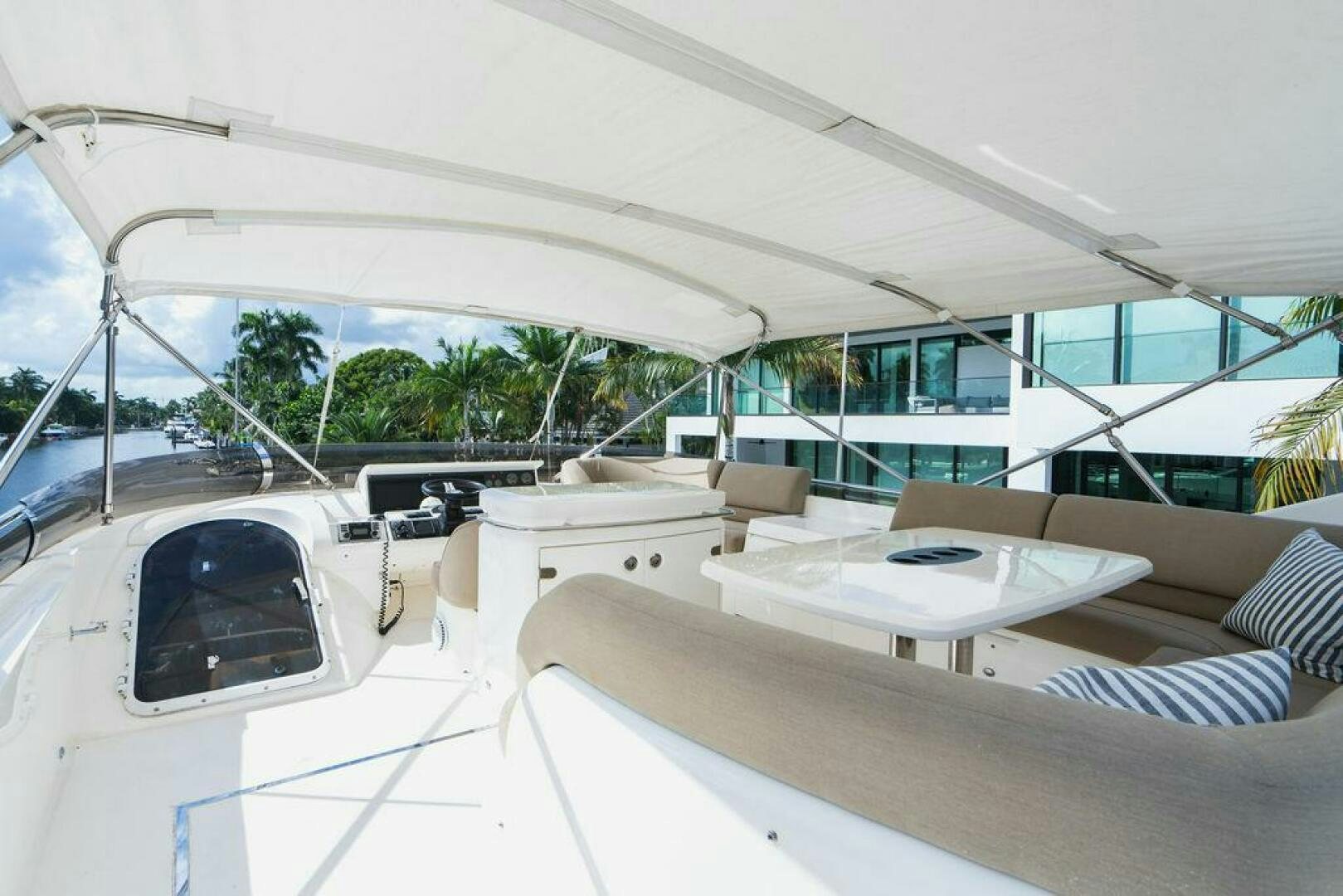 a room with a couch and a table and a large white tent aboard EMPIRE SUN Yacht for Sale