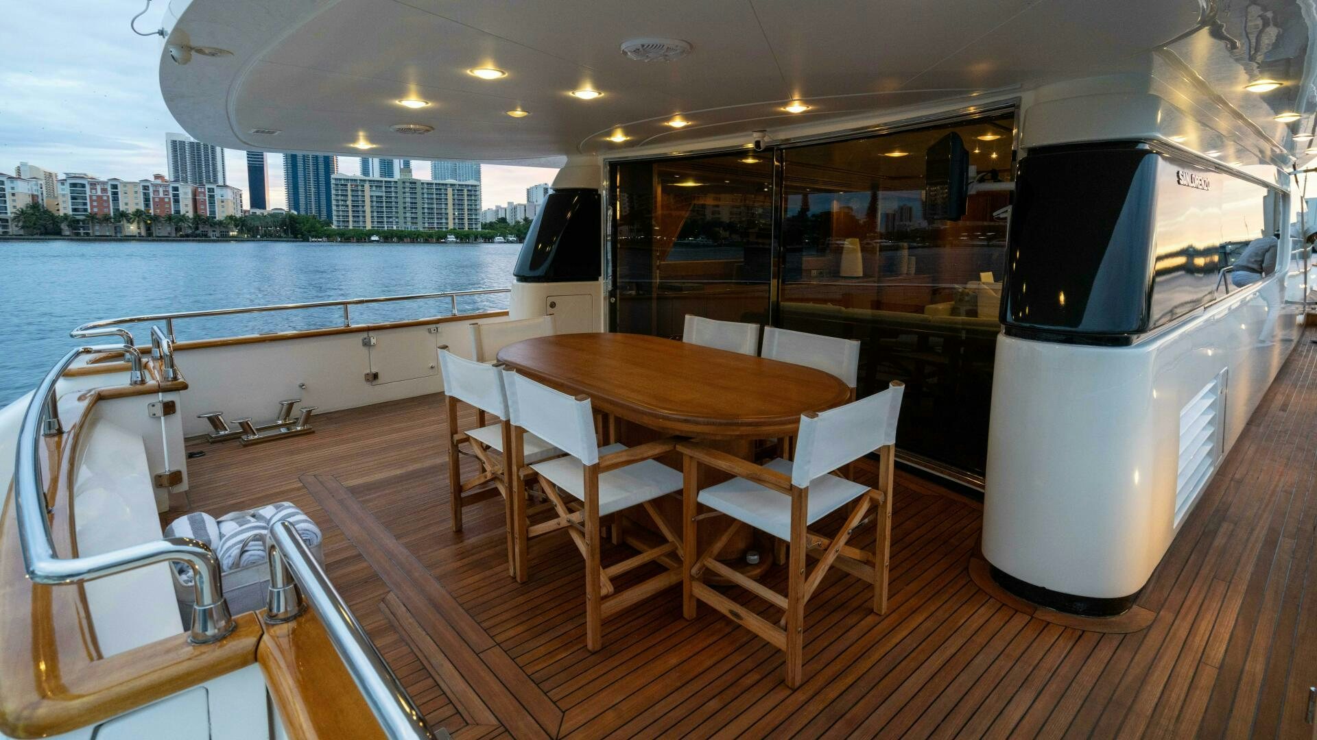 a table and chairs on a boat aboard LOSAND Yacht for Sale