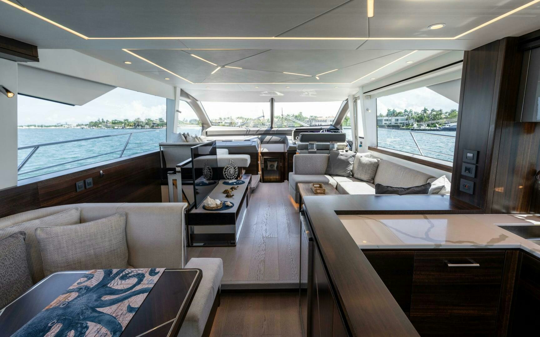 inside of a vehicle with a large window and a view of the water aboard 4-PLAY VII Yacht for Sale