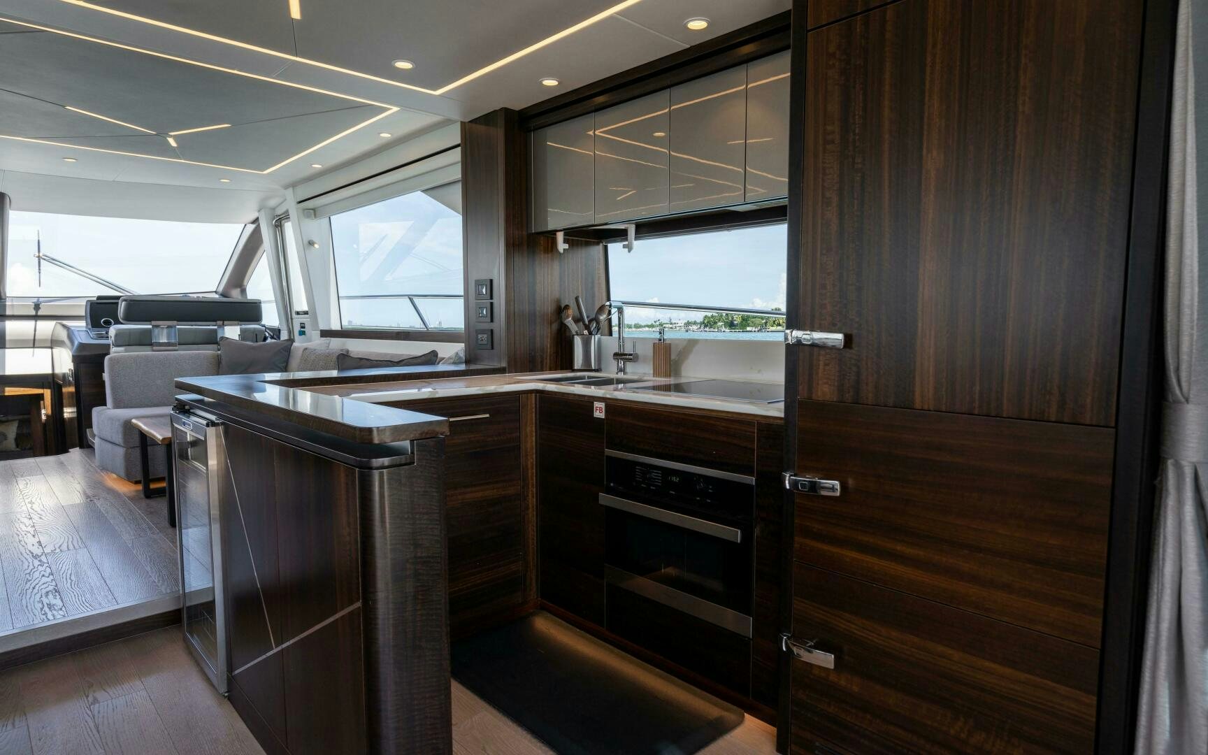 a kitchen with a large island aboard 4-PLAY VII Yacht for Sale