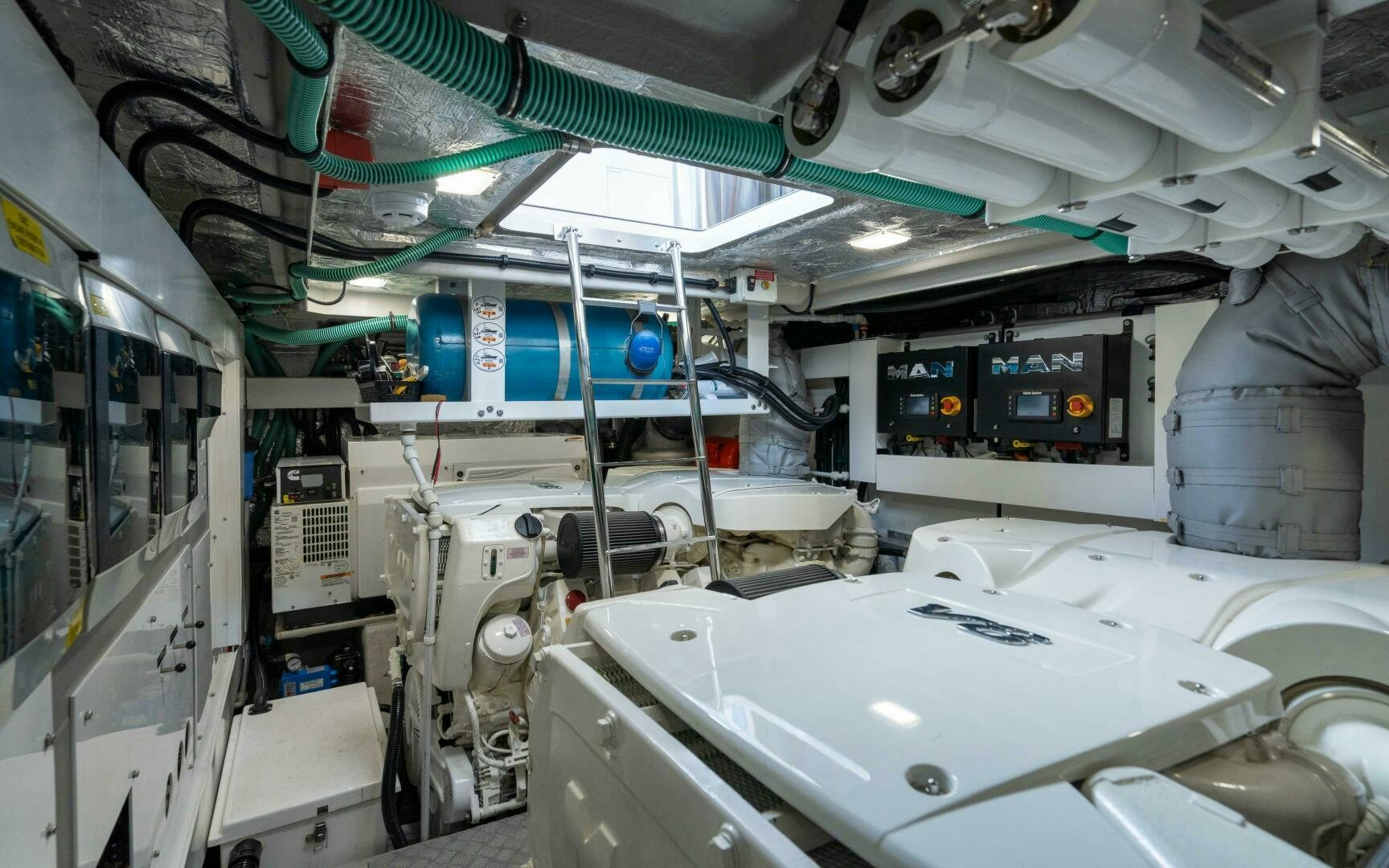 a room with several machines aboard 4-PLAY VII Yacht for Sale