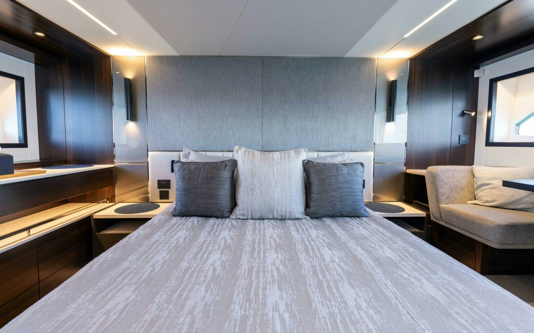a large bed in a room aboard 4-PLAY VII Yacht for Sale