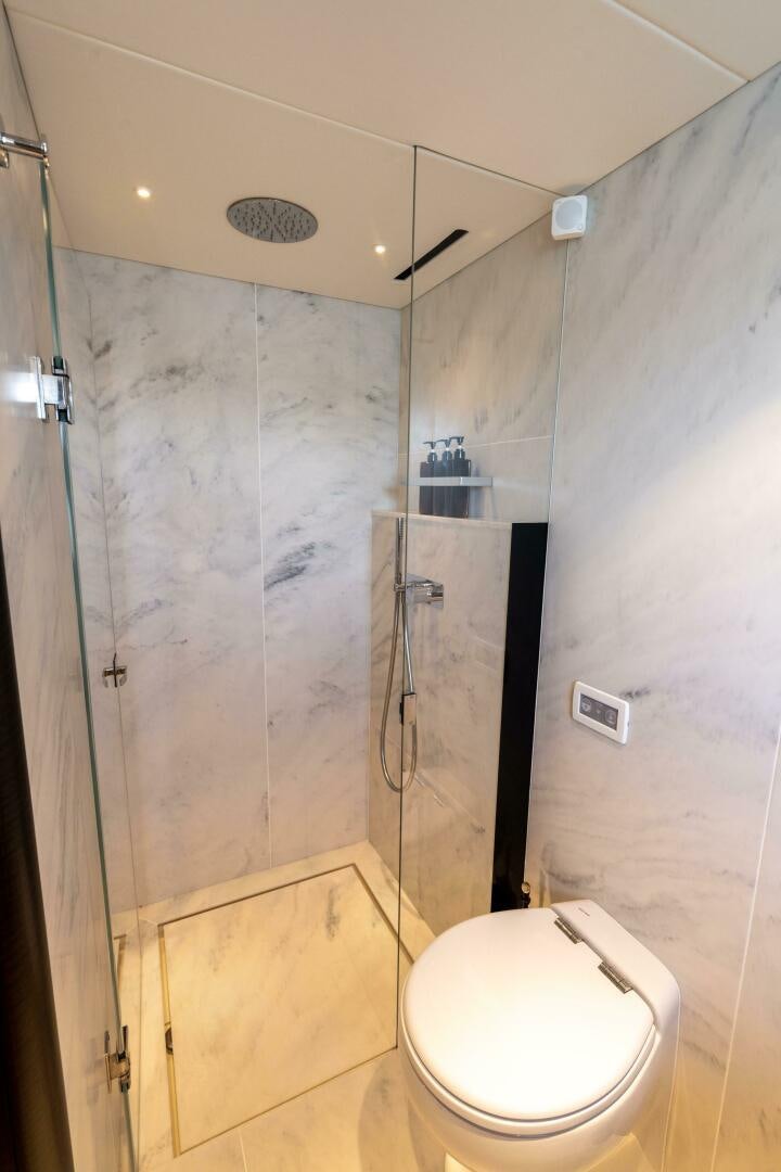 a bathroom with a toilet aboard 4-PLAY VII Yacht for Sale