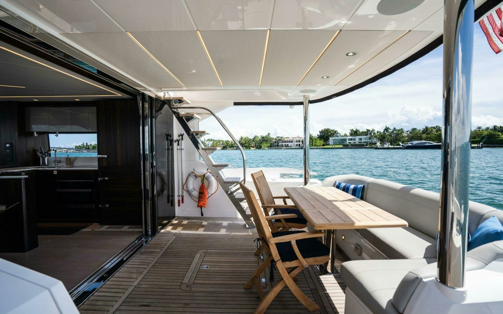 a boat with a table and chairs on it aboard 4-PLAY VII Yacht for Sale