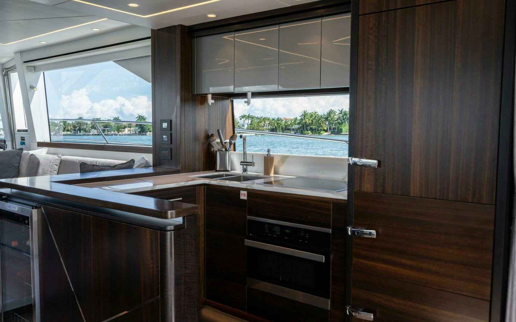 a kitchen with a sink and cabinets aboard 4-PLAY VII Yacht for Sale