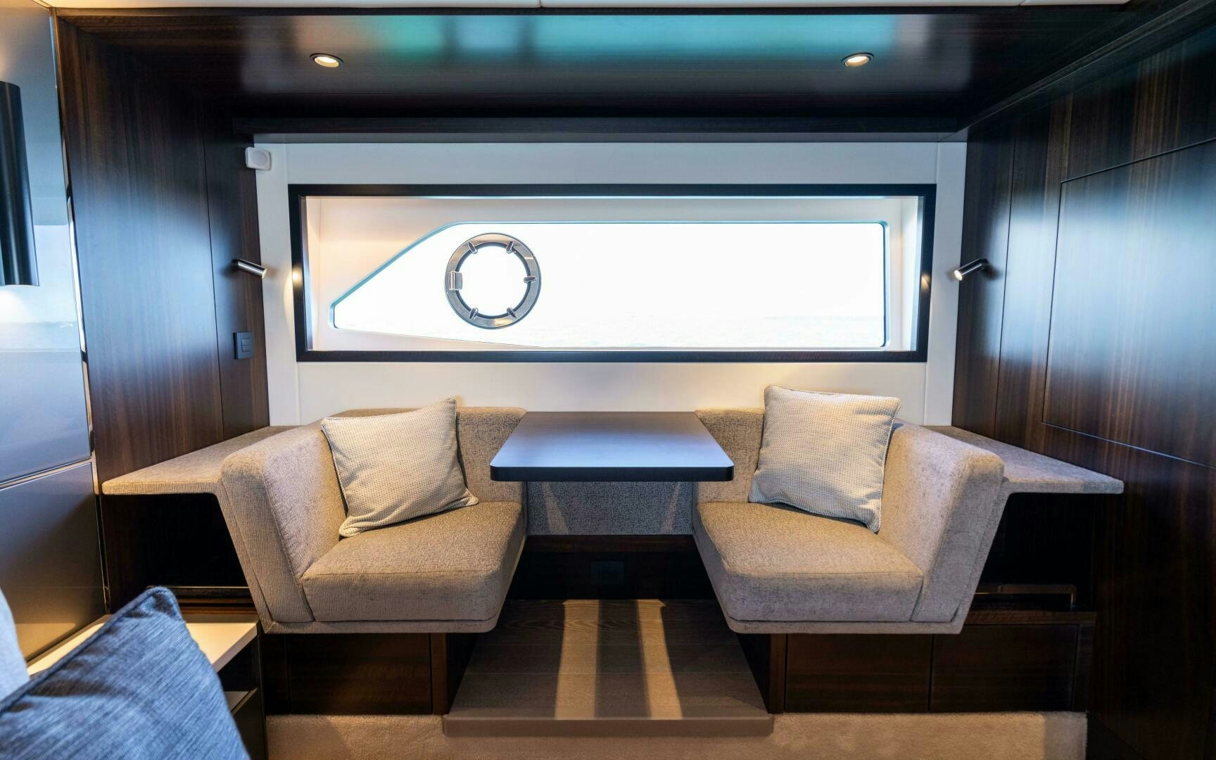 a room with a couch and a table aboard 4-PLAY VII Yacht for Sale
