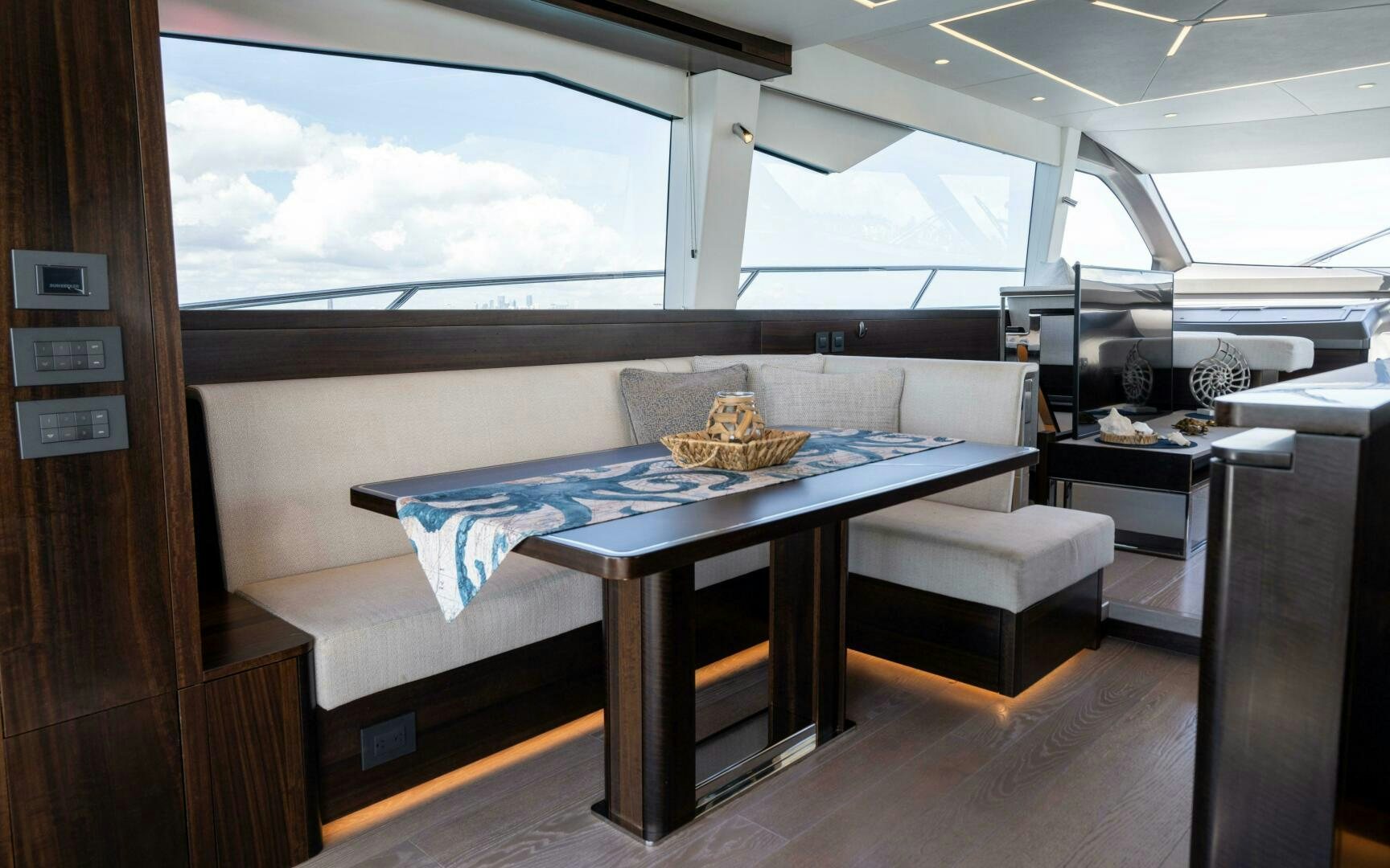 a room with a bed and a table aboard 4-PLAY VII Yacht for Sale