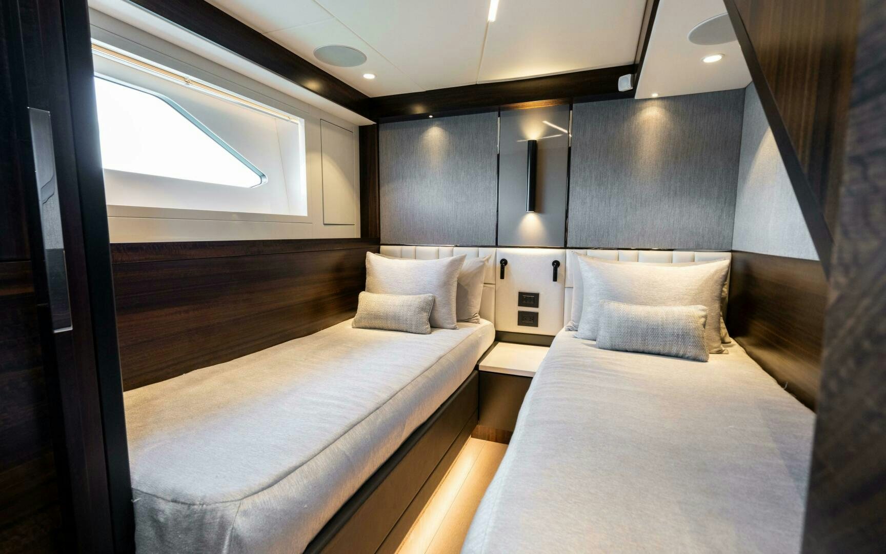 a room with two beds aboard 4-PLAY VII Yacht for Sale