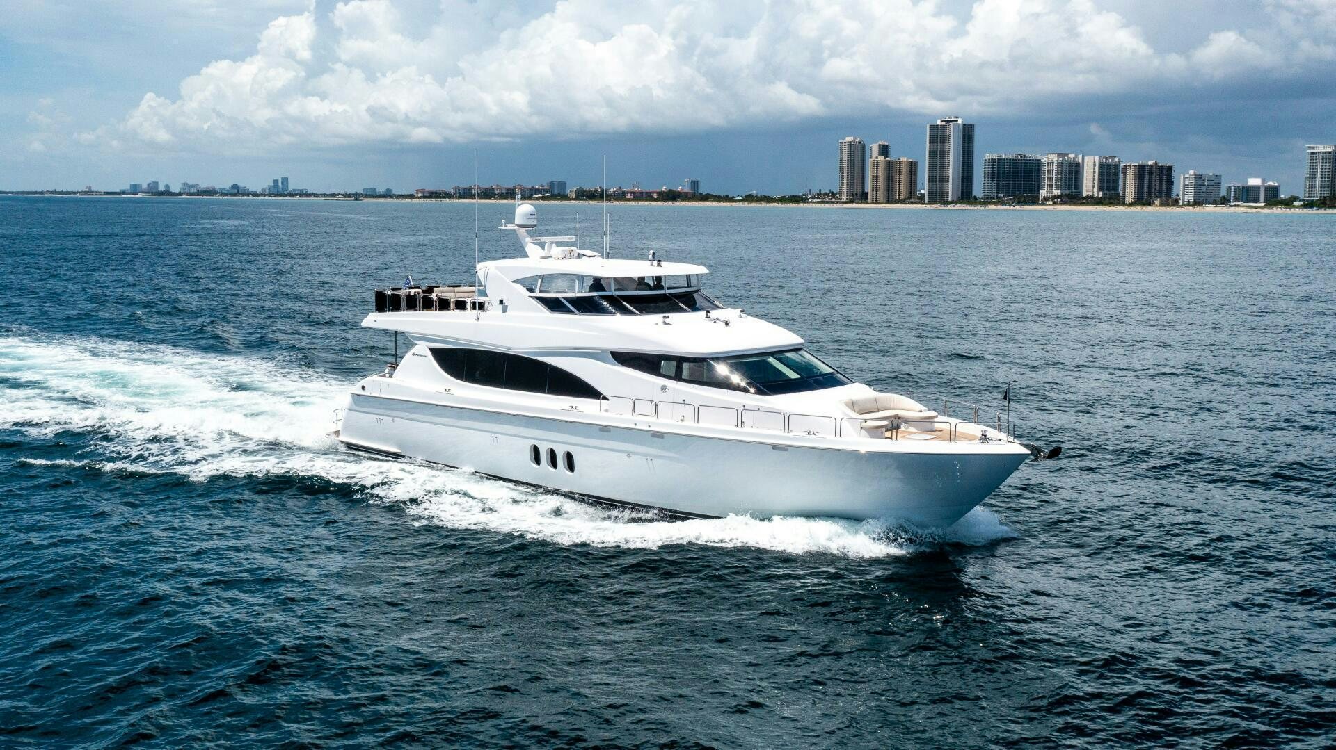 a white yacht in the water aboard CADZAN Yacht for Sale
