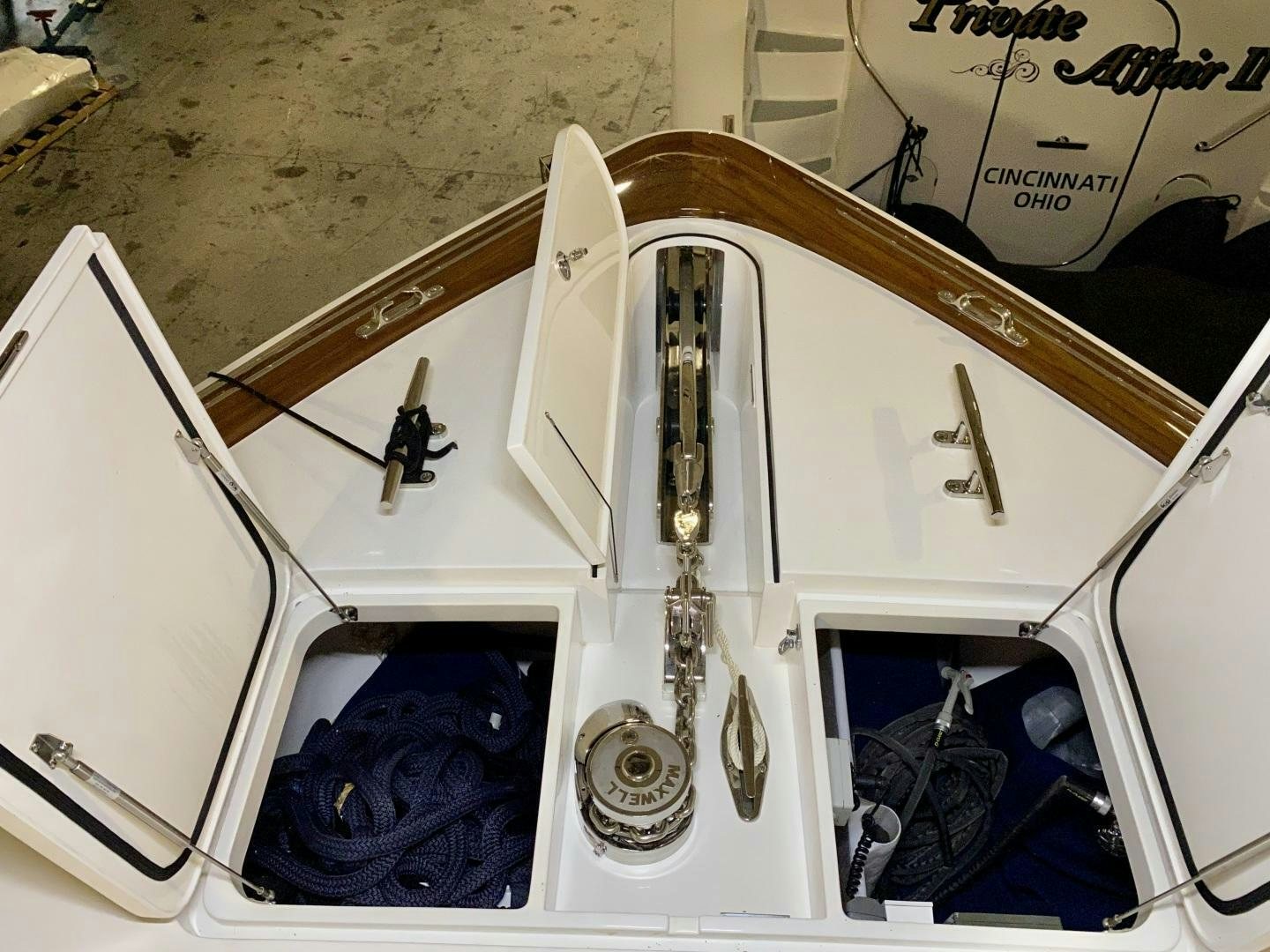 a white car with a scissor handle aboard AEI Yacht for Sale