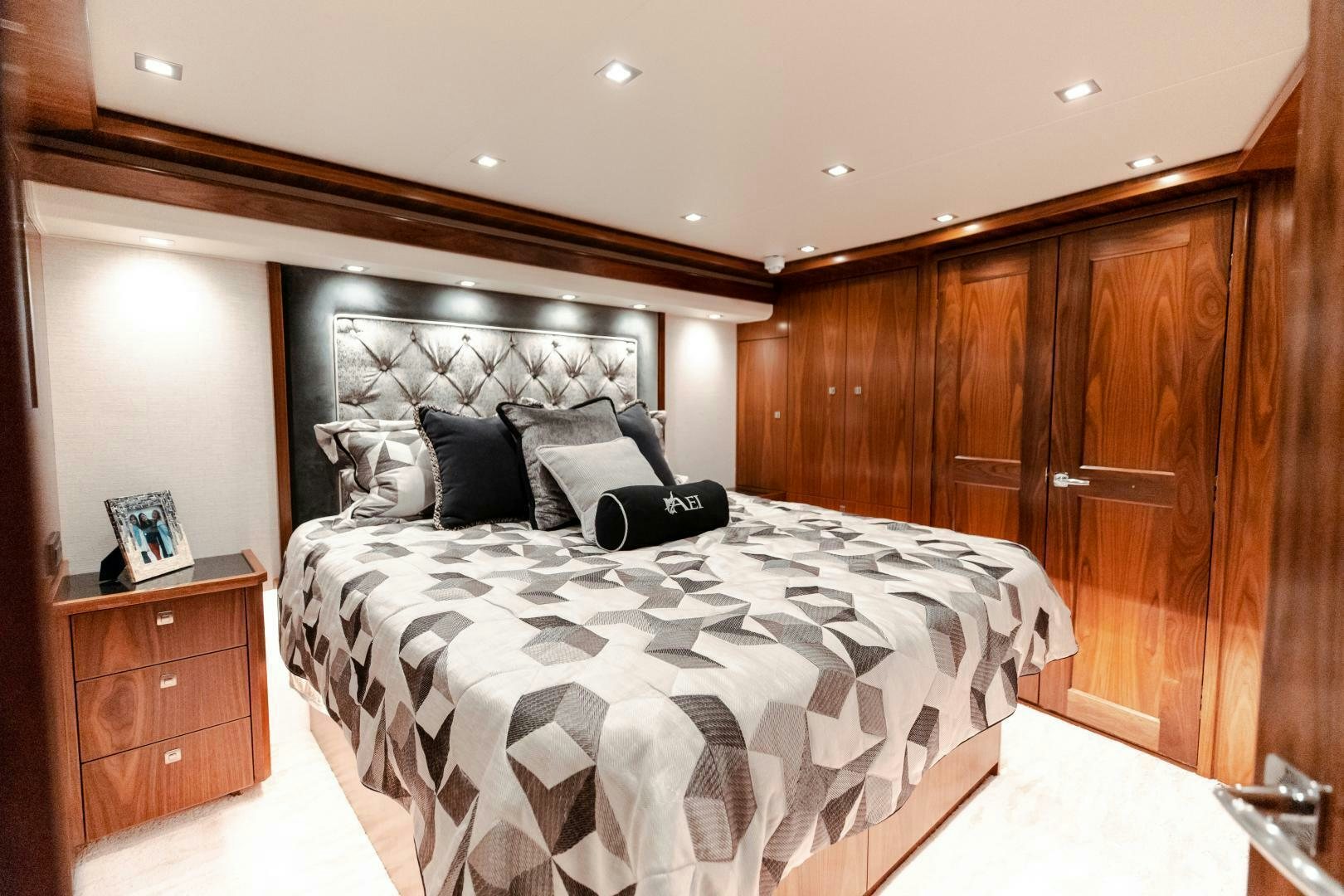 a bed in a room aboard AEI Yacht for Sale