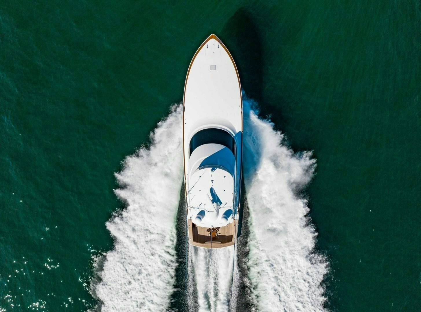 a snowboard on the snow aboard AEI Yacht for Sale