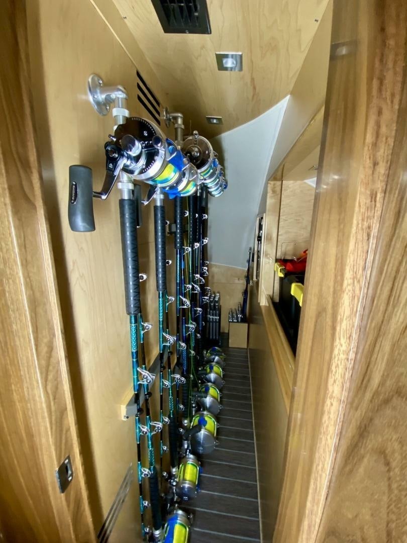 a group of toy weapons on a wall aboard AEI Yacht for Sale