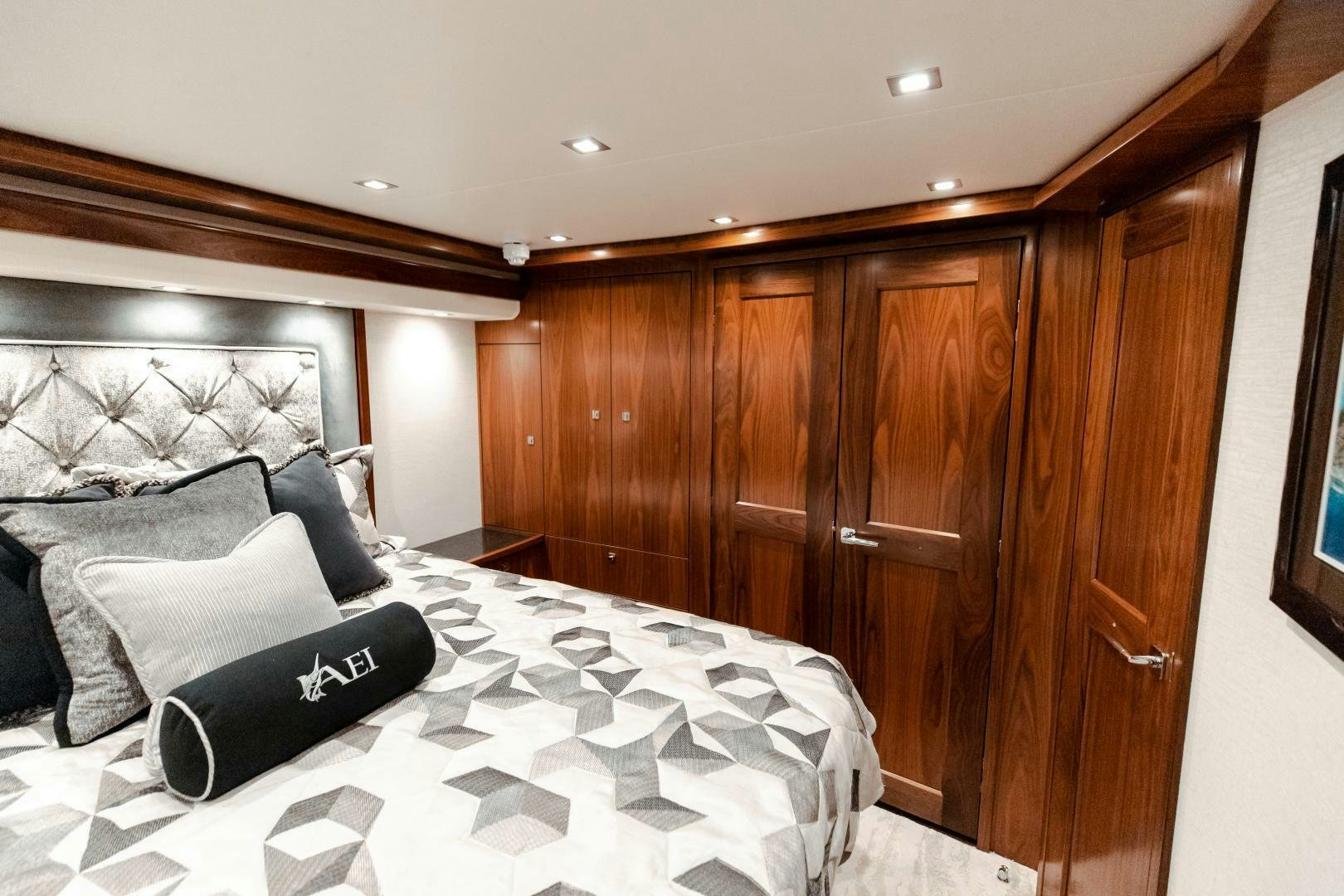 a bed in a room aboard AEI Yacht for Sale