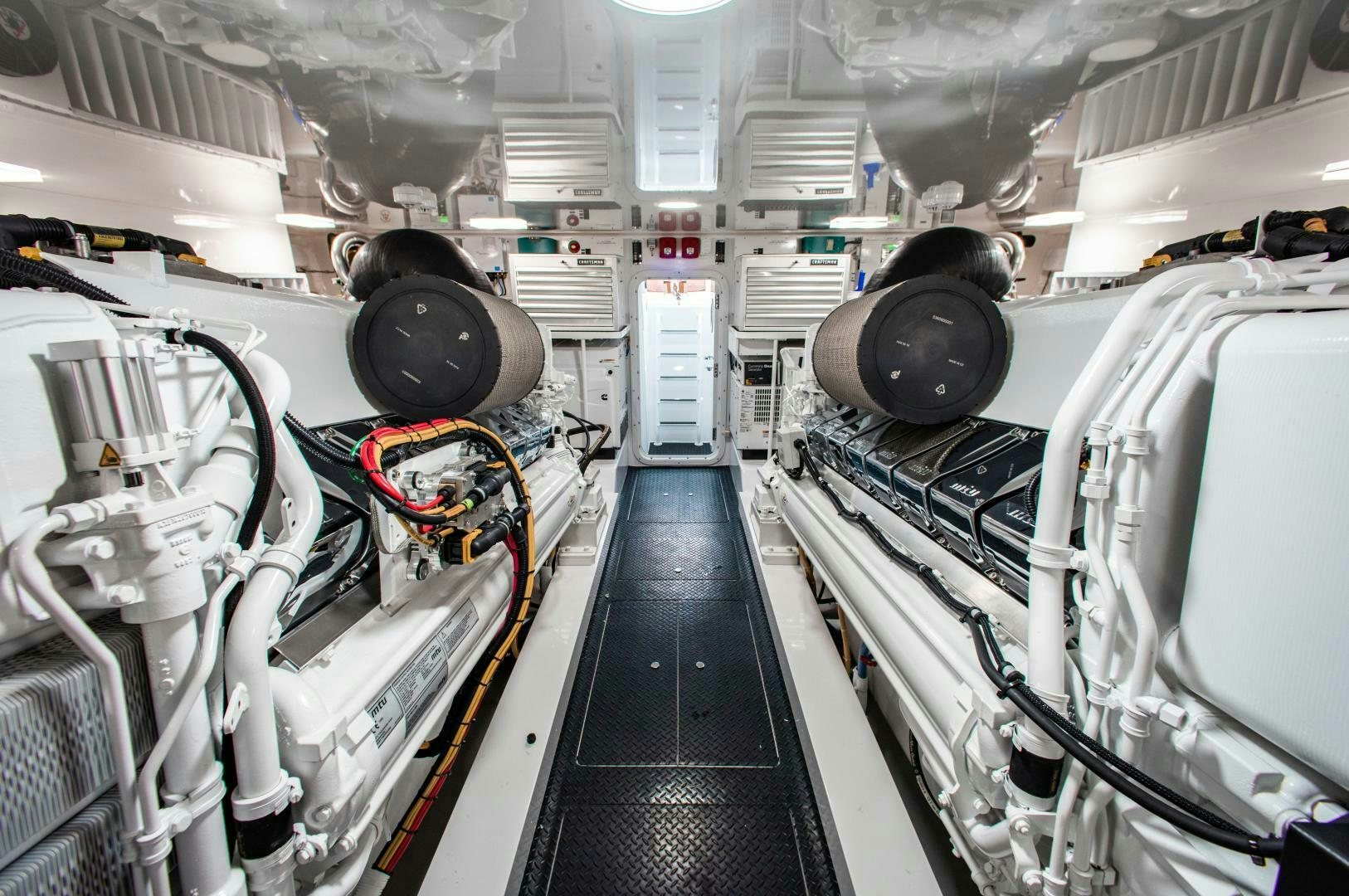 a large room with large machines aboard AEI Yacht for Sale