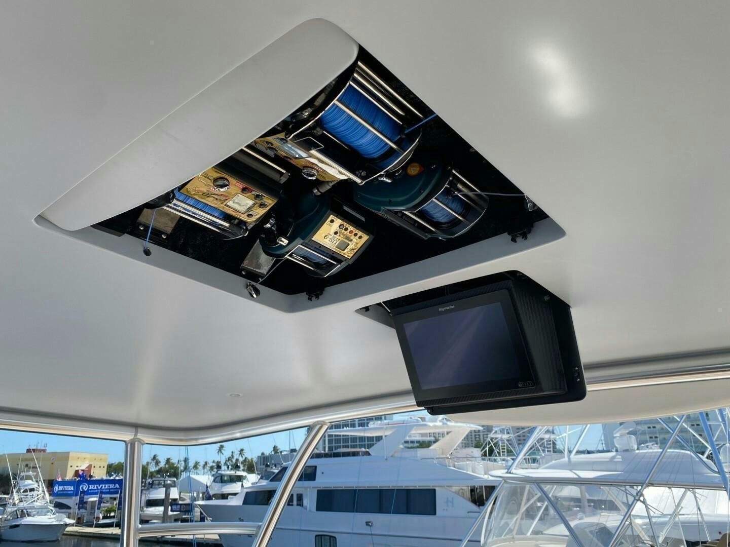 a tv on a shelf aboard AEI Yacht for Sale