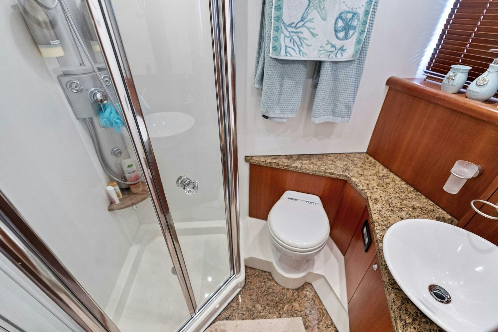 a bathroom with a sink toilet and a shower aboard PERSISTENCE Yacht for Sale