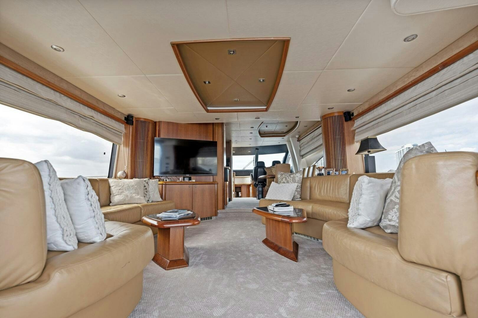a living room with a couch and a table aboard PERSISTENCE Yacht for Sale