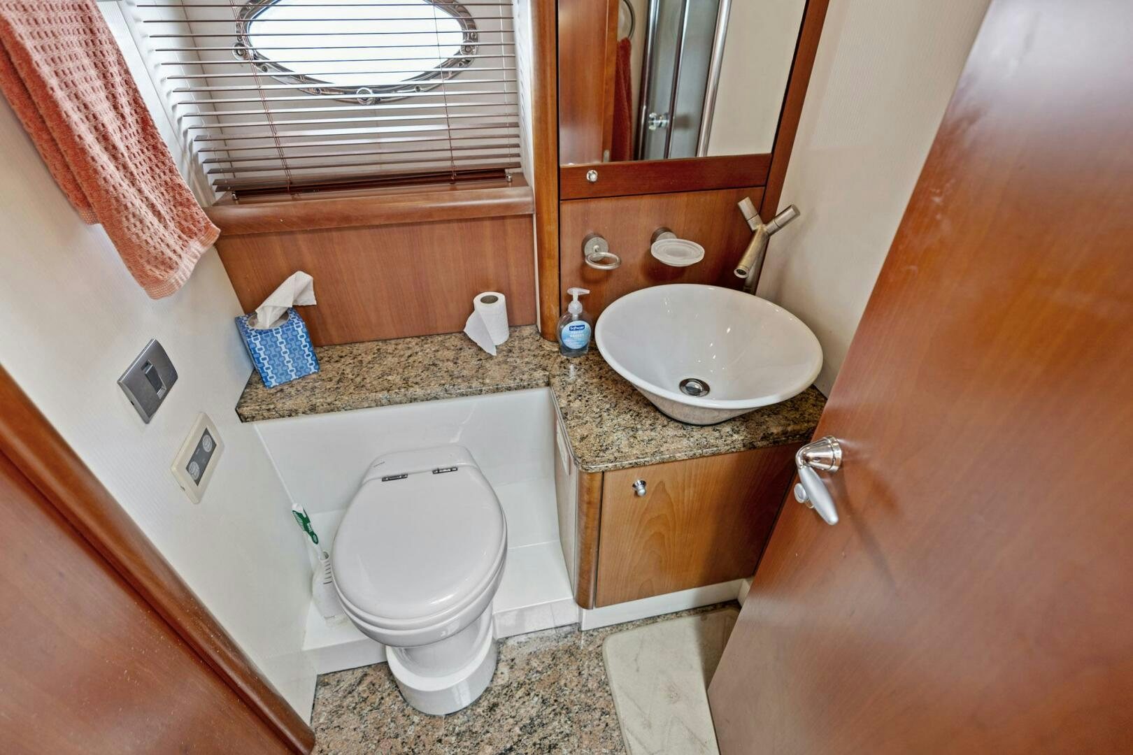 a bathroom with a sink and toilet aboard PERSISTENCE Yacht for Sale