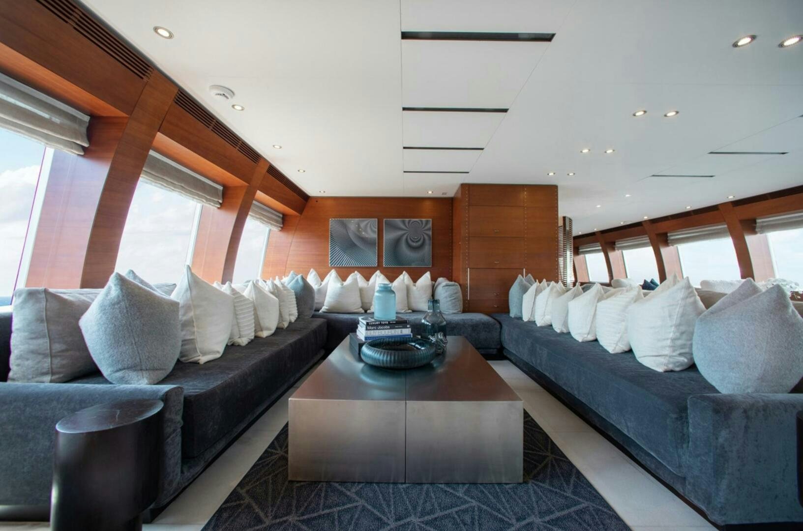 a room with a couch and a table aboard MATRIX Yacht for Sale