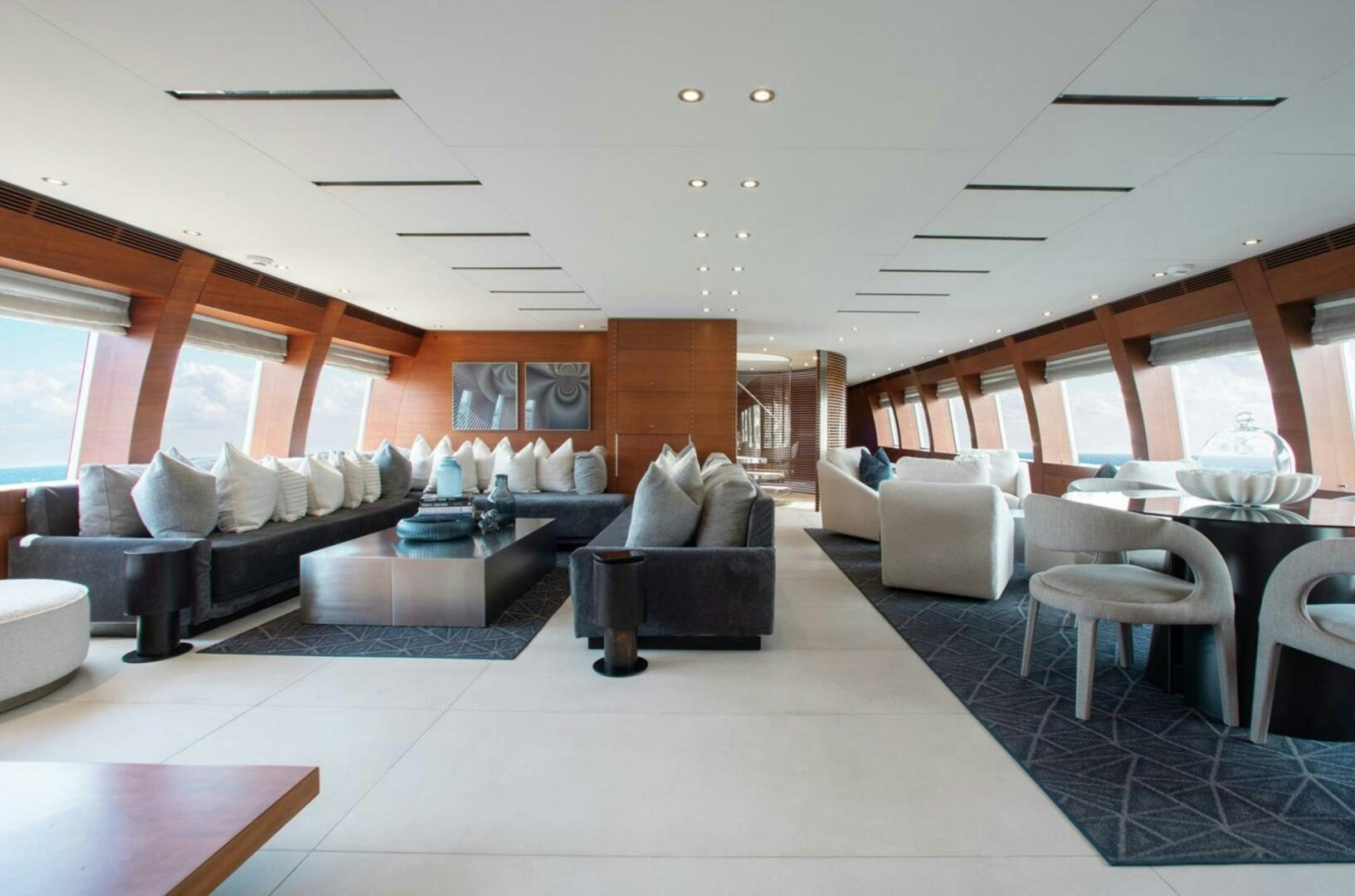 a living room with a couch and a table aboard MATRIX Yacht for Sale