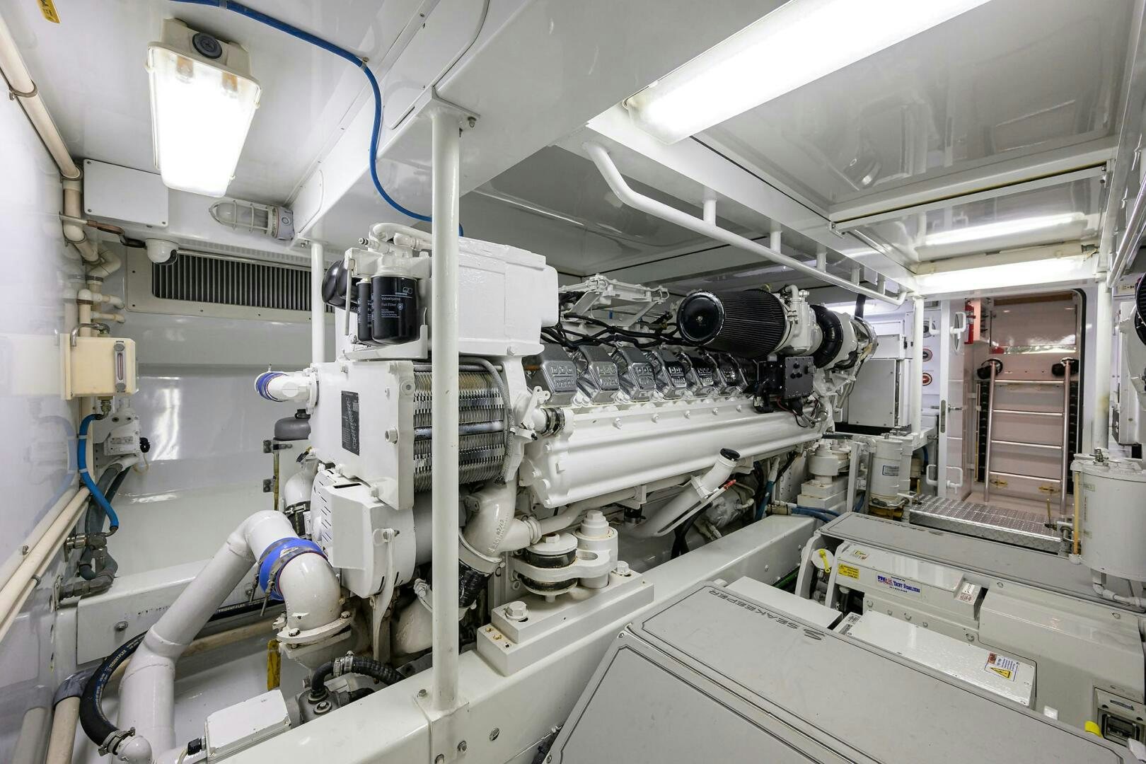 a machine in a room aboard BUSINESS STINKS Yacht for Sale