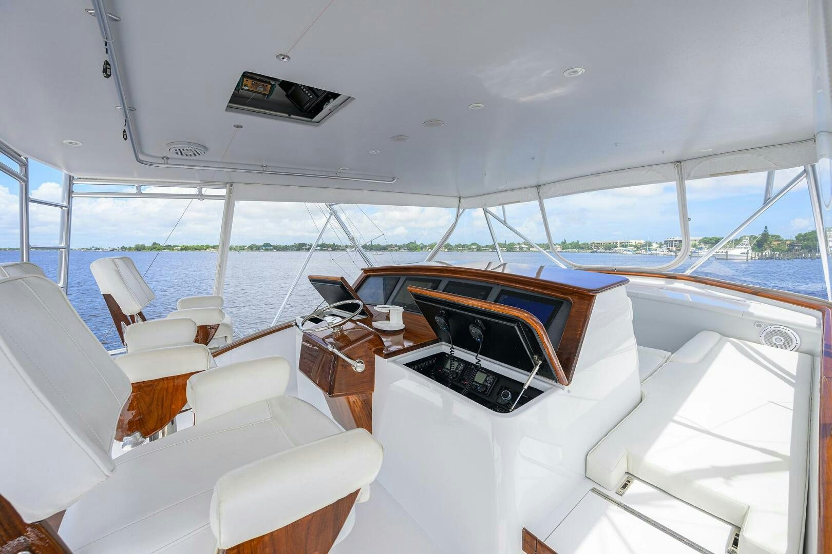 a boat with a laptop on it aboard BUSINESS STINKS Yacht for Sale