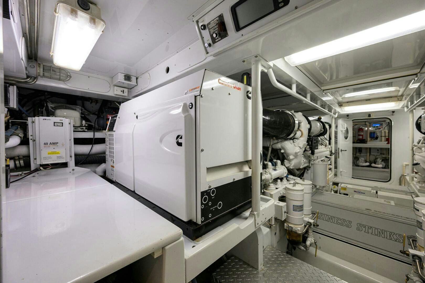 a large machine in a room aboard BUSINESS STINKS Yacht for Sale