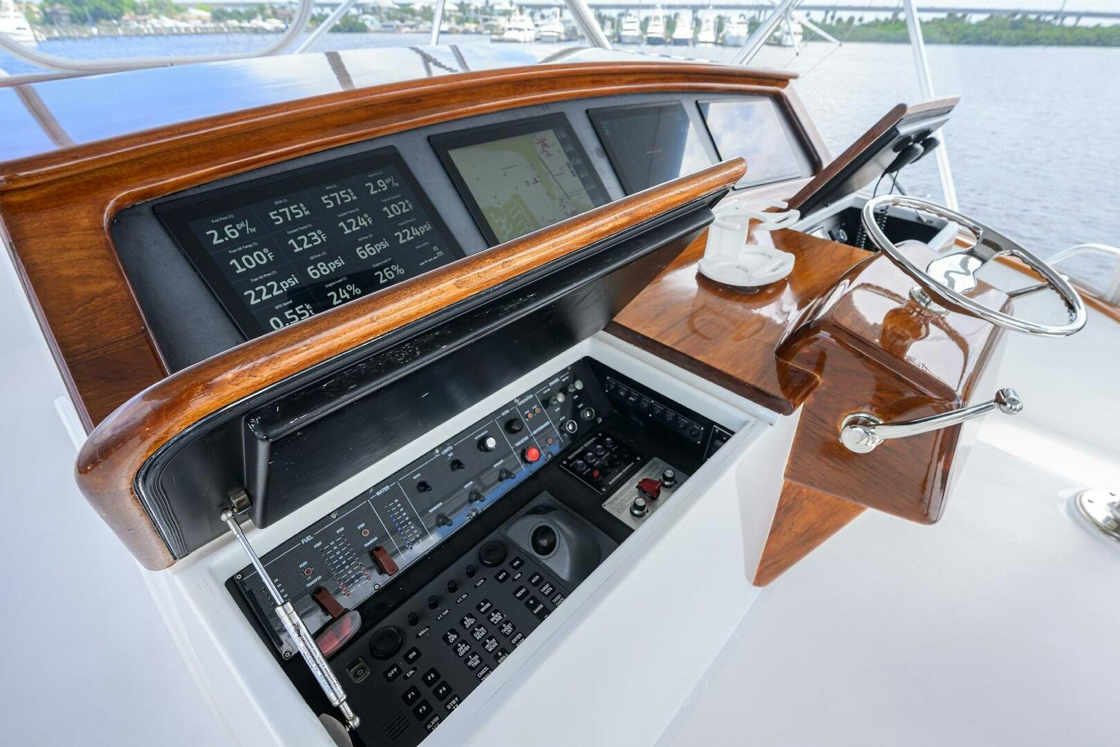 a wooden box with a key chain aboard BUSINESS STINKS Yacht for Sale