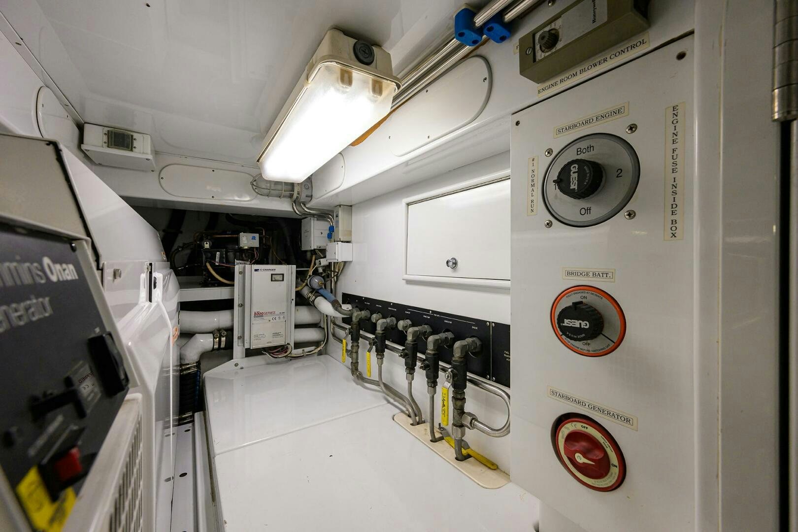 a white machine with a light on it aboard BUSINESS STINKS Yacht for Sale