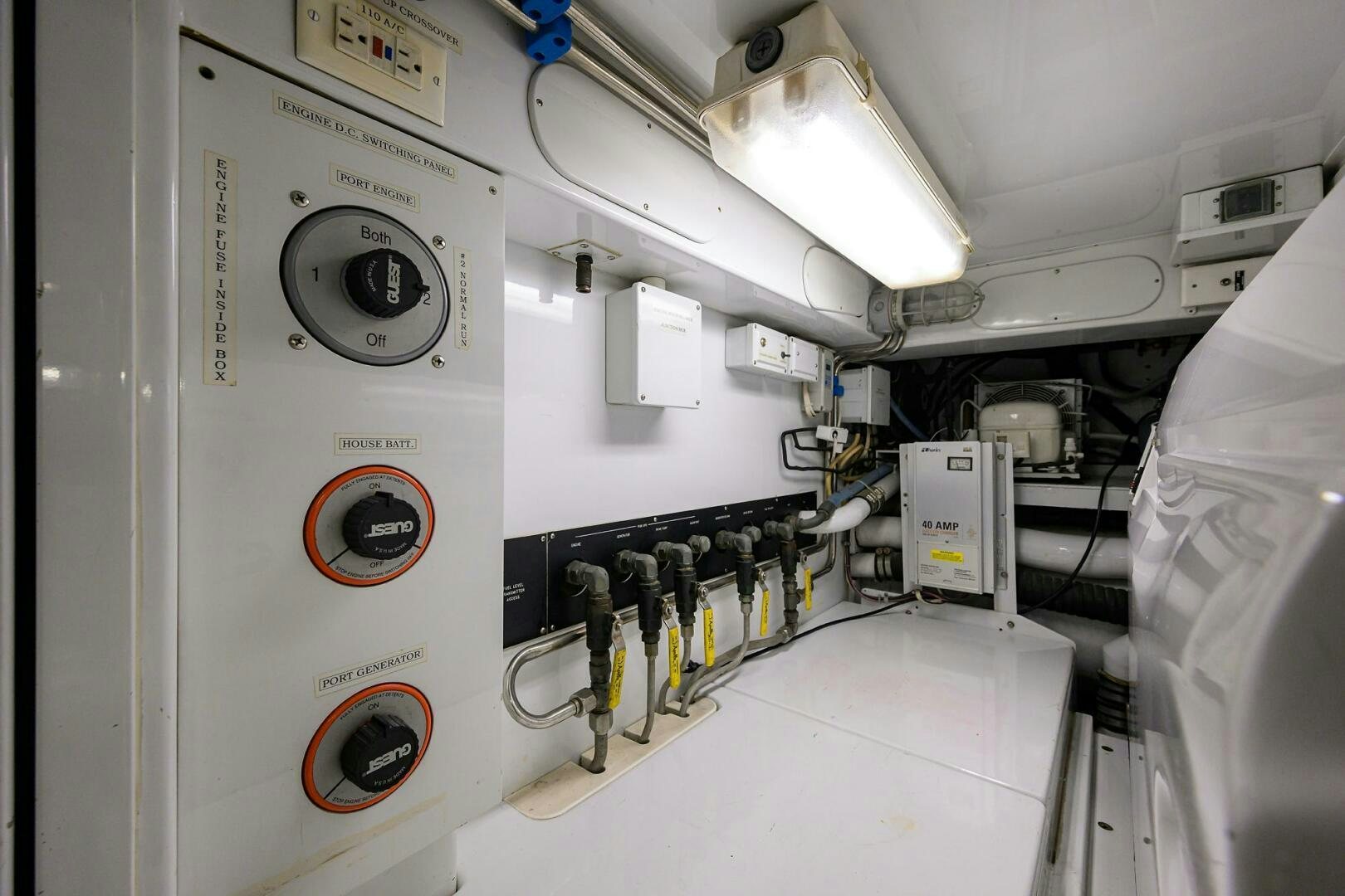 a white machine with a light on it aboard BUSINESS STINKS Yacht for Sale