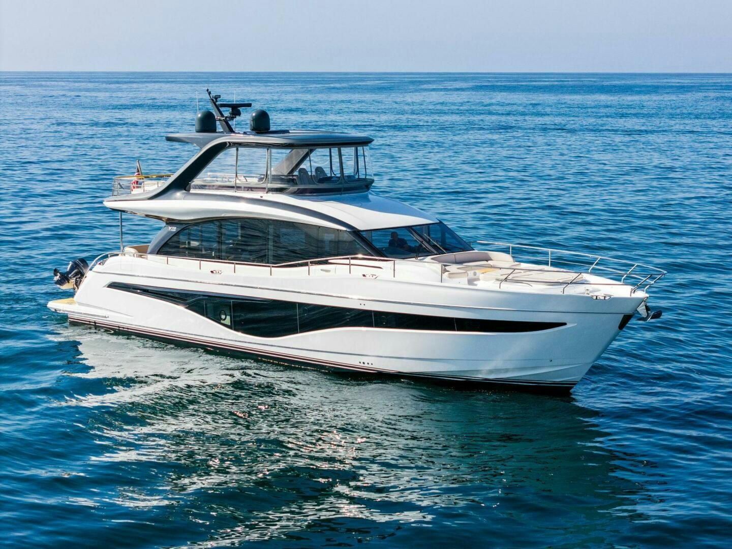 a white yacht in the water aboard ROBRI MAR Yacht for Sale