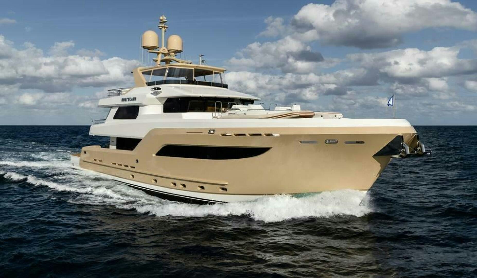 a white yacht on the water aboard NORTHLAND Yacht for Sale