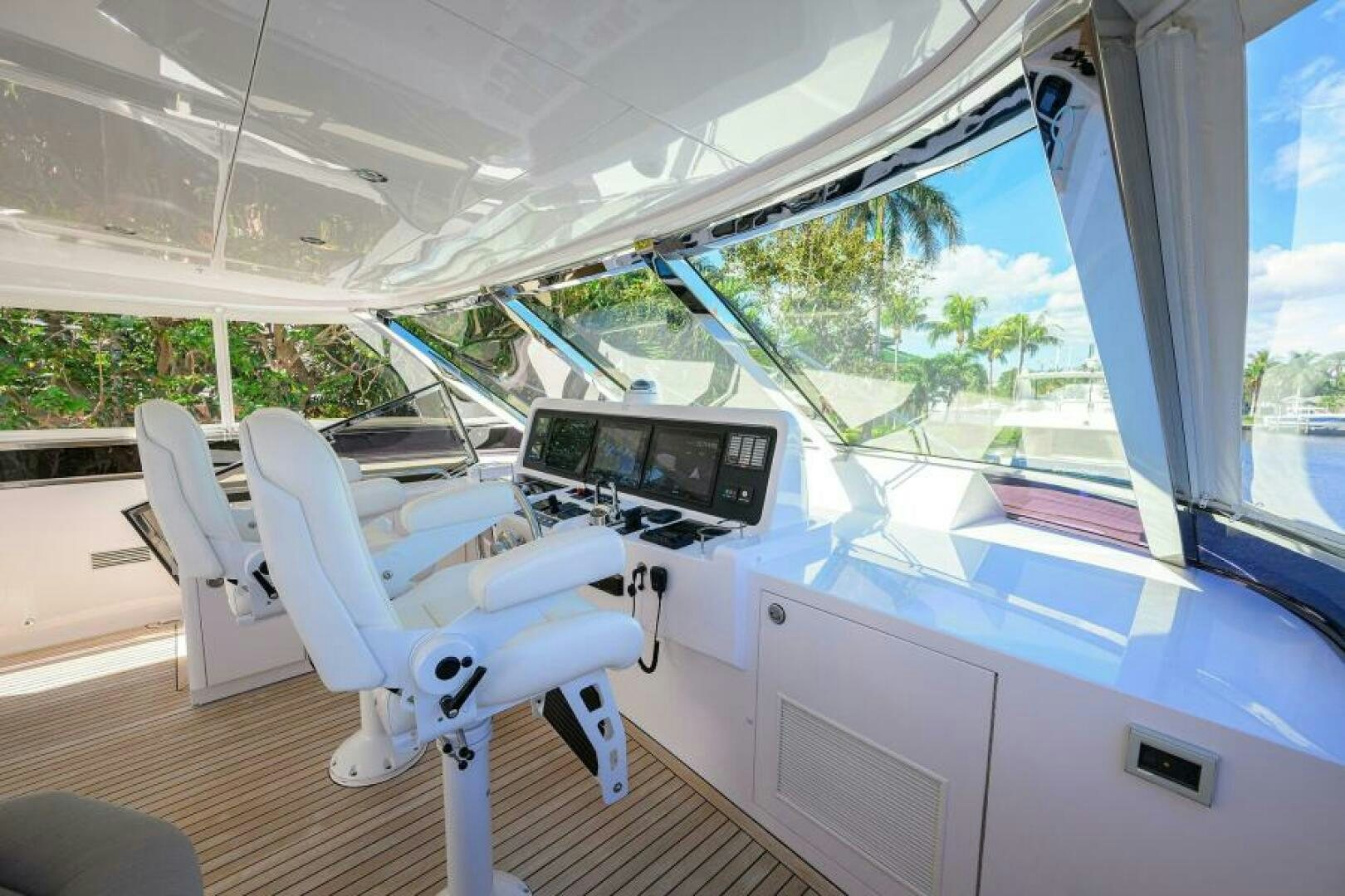 a white chair in a room aboard JOURNEY Yacht for Sale