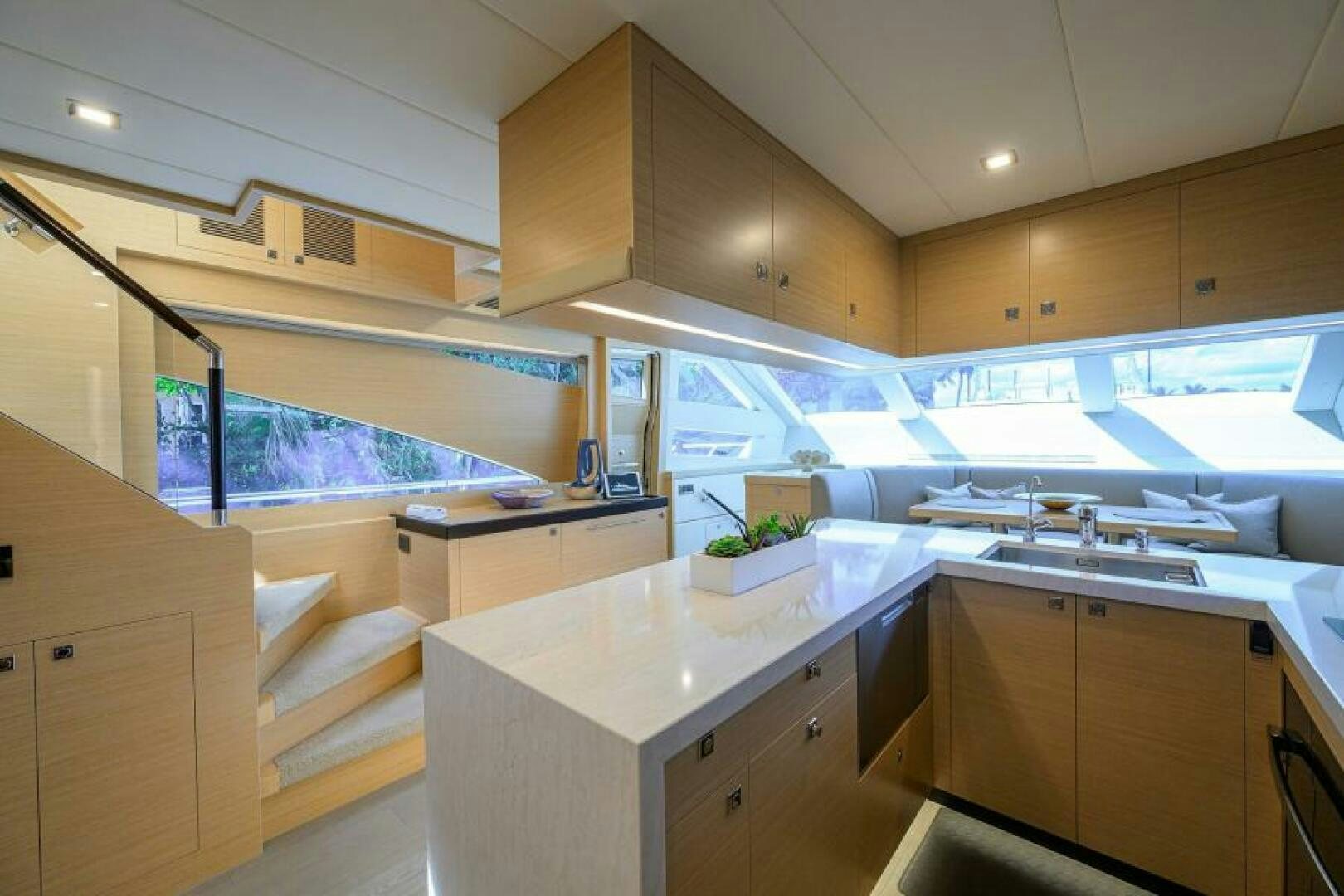 a kitchen with a large window aboard JOURNEY Yacht for Sale