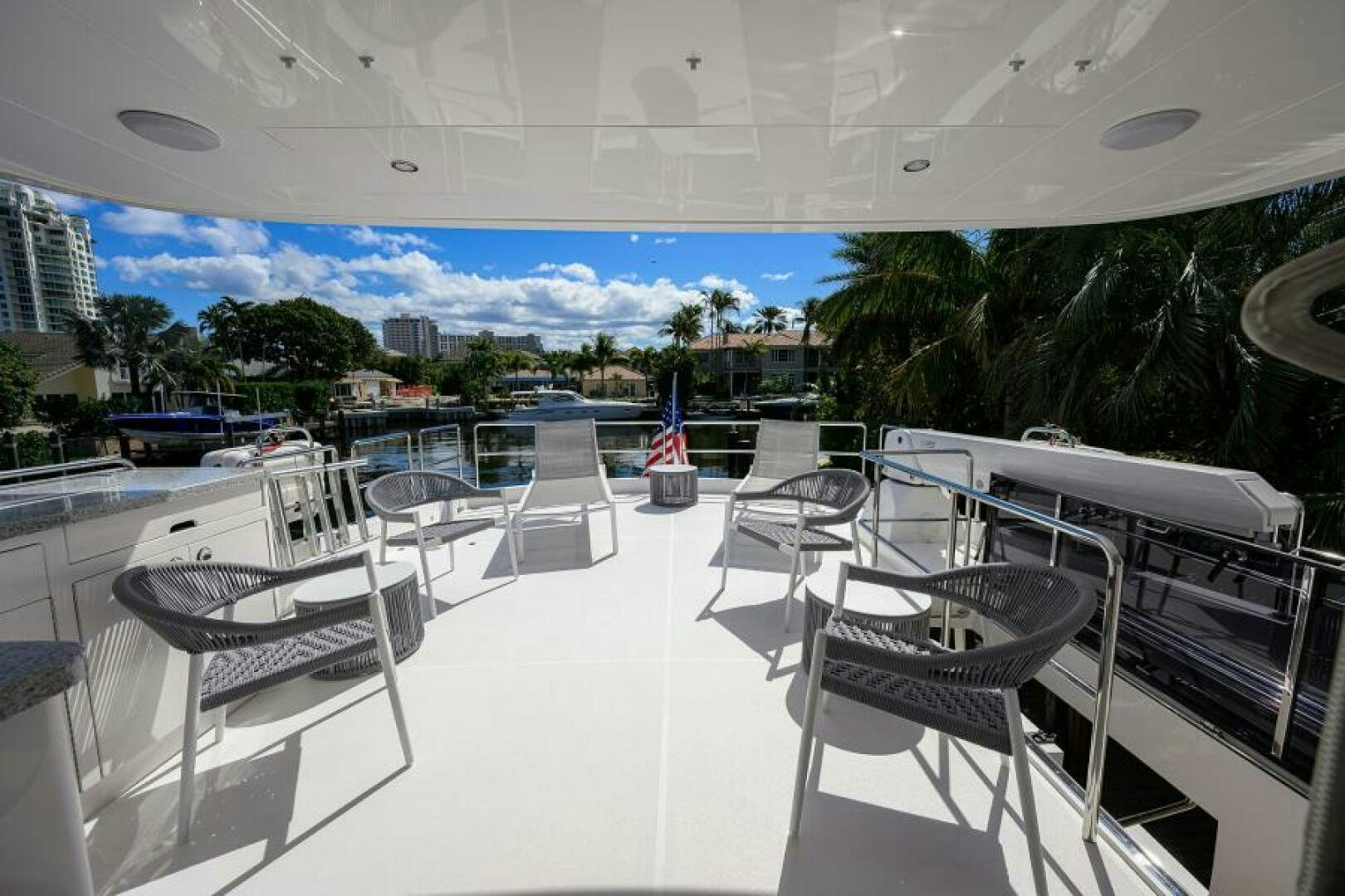 a room with chairs and tables aboard JOURNEY Yacht for Sale