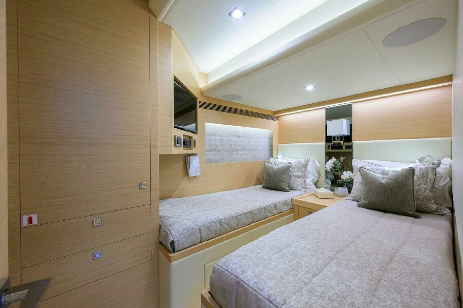 a room with two beds aboard JOURNEY Yacht for Sale