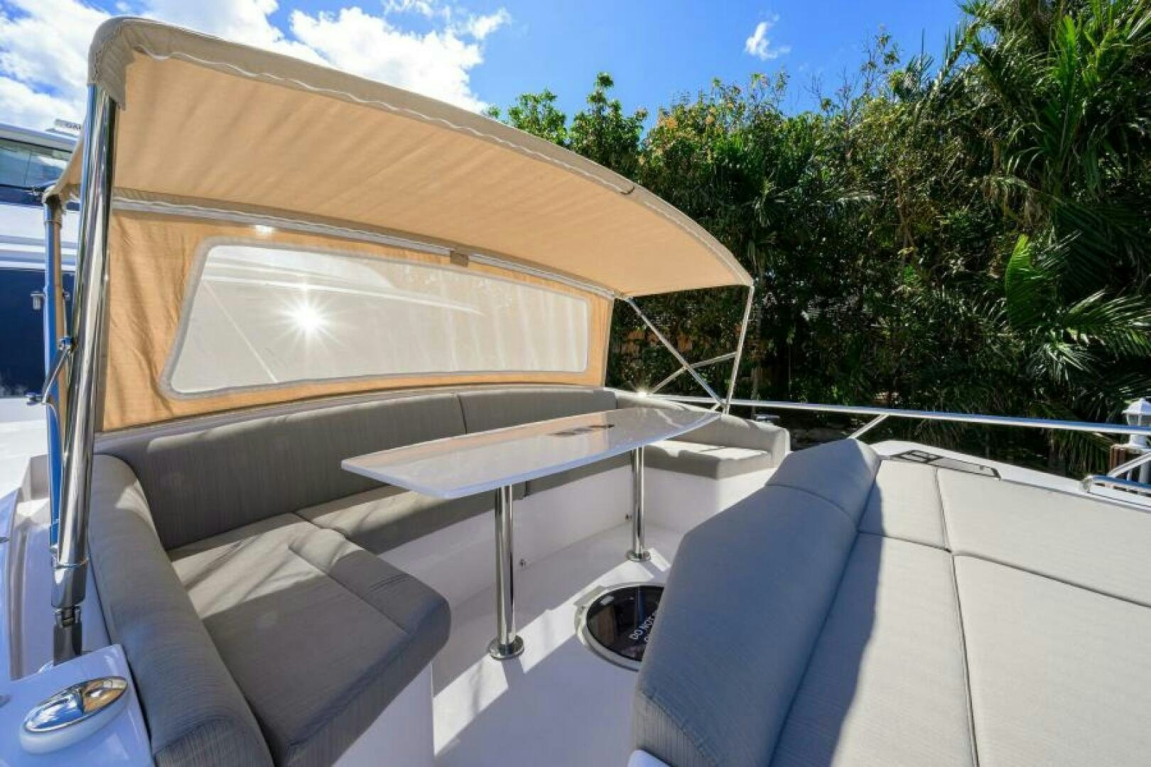 a boat with a canopy aboard JOURNEY Yacht for Sale