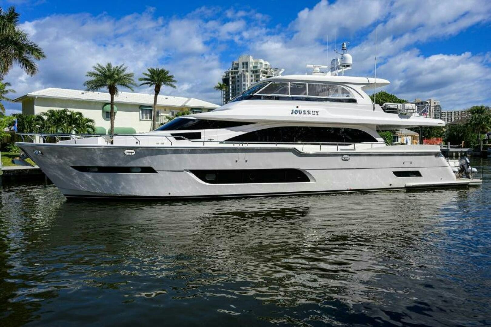 a white yacht in the water aboard JOURNEY Yacht for Sale