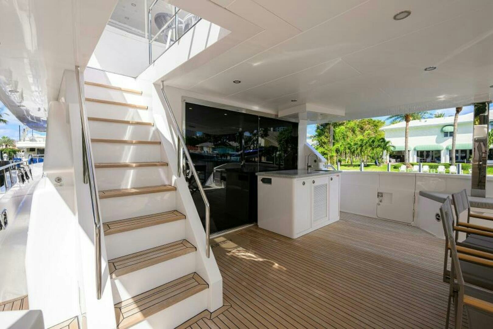 a modern house with a staircase aboard JOURNEY Yacht for Sale