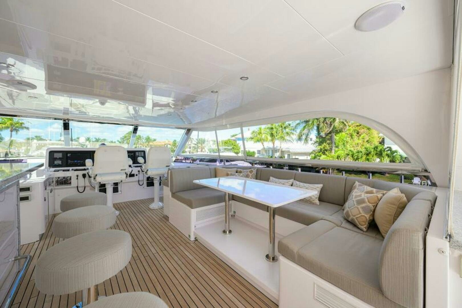 a large room with a couch and a table aboard JOURNEY Yacht for Sale