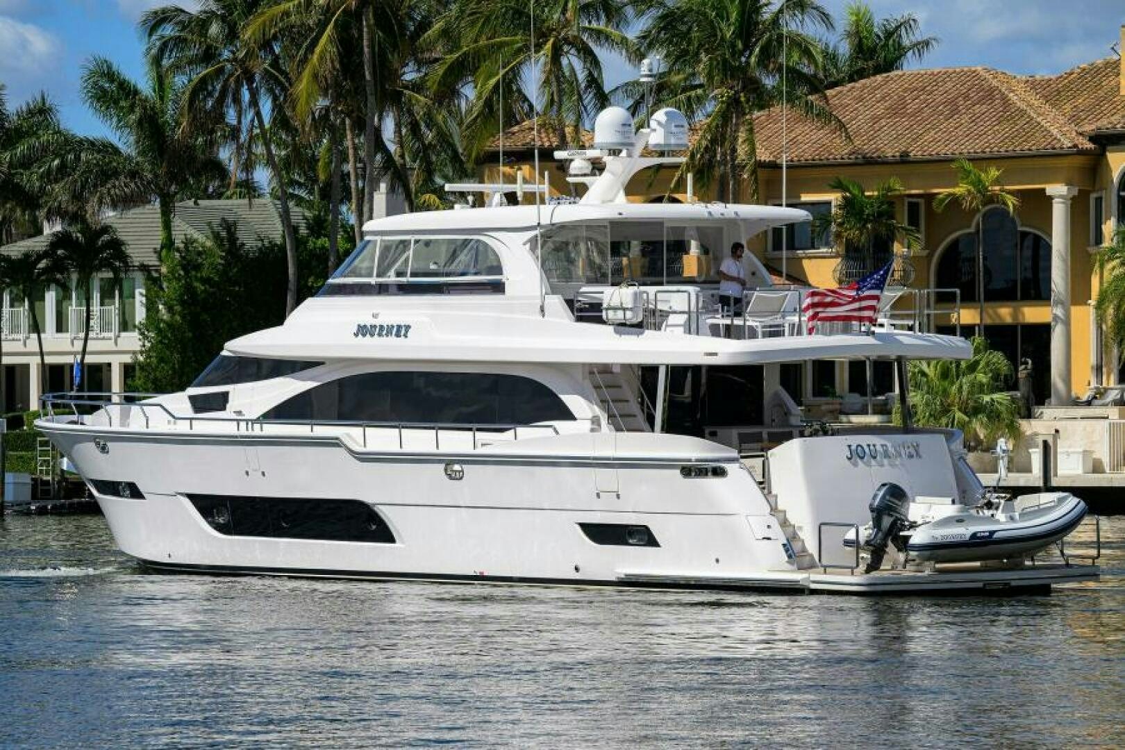 a white yacht in the water aboard JOURNEY Yacht for Sale