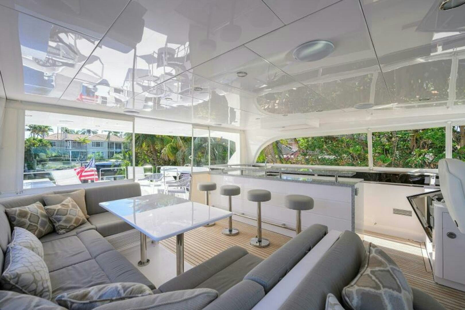 a room with a table and chairs aboard JOURNEY Yacht for Sale