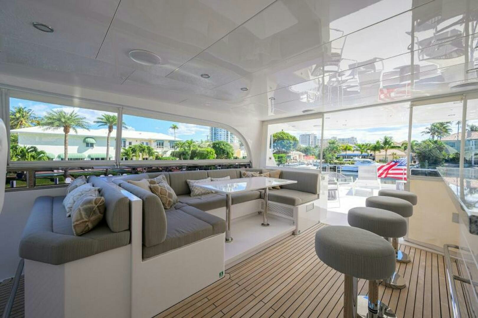 a living room with a large window aboard JOURNEY Yacht for Sale